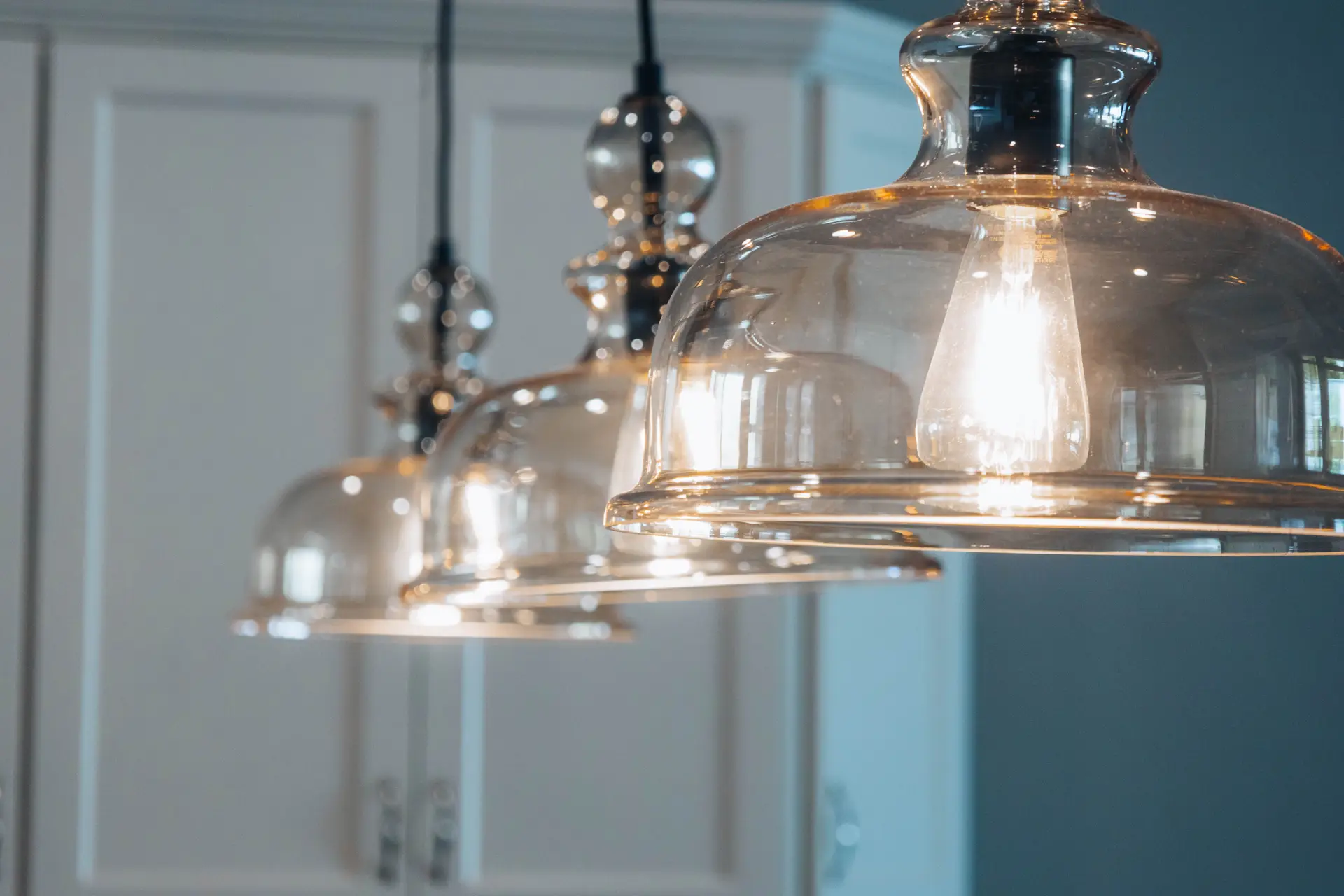 Warm hand-blown glass luminaire details